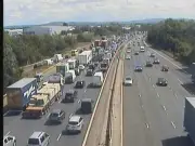 M6 crash causes hours of queues after central reservation damage