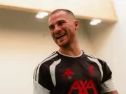 Mac Allister back in Liverpool training with new hair