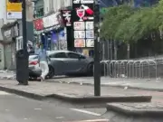 Man arrested after car mounts pavement injuring three in Bristol