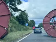 Man charged after giant cable spools spill onto A77 in lorry crash