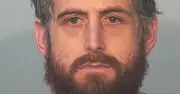 Man charged with arson after cutting off genitals and setting them on fire