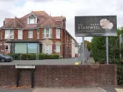 Man charged with attempted murder after stabbing at migrant hotel
