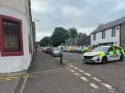 Man dies after being found injured on Ayrshire street; assault arrest made