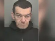 Man jailed for hiding arson suspect's body in wheelie bin