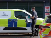 Man stabbed in car near Manchester station; two arrested