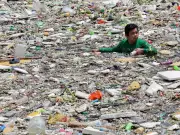 Manila Workers Clear Trash Trap After Monsoon Rains