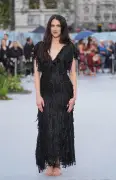 Margaret Qualley Walks Barefoot in Chanel Sandals at London Premiere