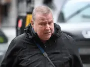 Maths teacher banned for touching pupils' hair and singing 'I love you'