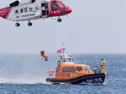 Migrant Boat Fire in English Channel: 157 Rescued by Coastguard
