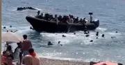 Migrants Storm Beach Near La Manga Resort in Spain