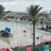 Mini-tsunami hits Ibiza beach forcing tourists to flee flooding