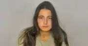 Mother accused of slitting children's throats told dad 'say goodbye'