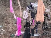 Motherwell baffled by clothes and furniture strewn in woodland