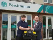 MP presents apprentice bricklayer with new kit at Coatbridge development