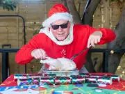 Mr Christmas marks 33 years of daily festive celebrations despite heatwave
