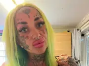 Mum with 120 tattoos hits back at trolls who say kids are better off without her