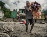 Nepal flood survivors return to rebuild homes after river disaster