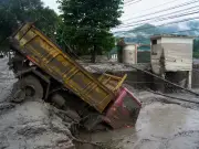 Nepal floods kill 389, 33 Brits missing after glacier collapse