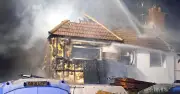 New Malden fire: Huge blaze rips through home as 70 firefighters scrambled