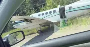 One dead, 10 injured after plane makes emergency landing on Canadian road