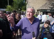 PETA stages mock dog barbecue protest outside Clarkson's pub
