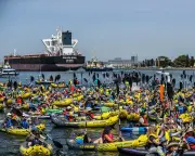 Police drop charges against 125 Rising Tide protesters