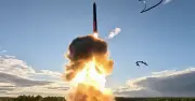Putin launches nuclear-capable ICBM in chilling warning to West