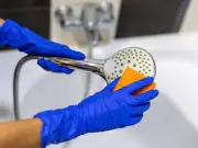 Remove shower limescale with natural lemon or vinegar cleaner