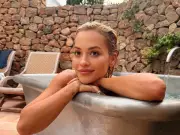 Rita Ora stuns in silver bikini during yacht holiday