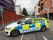 Robbery suspect in hospital after police swoop in Moss Side