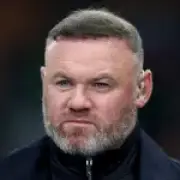 Rooney backs Arsenal for title, predicts Man United fourth