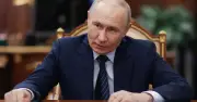 Russians forced to cancel holidays and milk cows as economy collapses