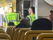 Ryanair passengers vomit, strip off in sweltering plane ordeal