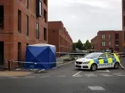 Salford attempted murder probe after man falls from balcony