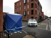 Salford balcony death: two arrested on suspicion of murder