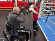 Scots boxing coach back in ring after losing both legs in health battle