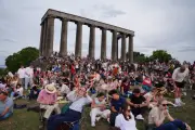 Scots contend with clouds to catch glimpse of rare solar eclipse