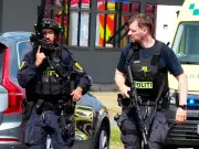 Several injured in Denmark town centre shooting as police hunt gunmen