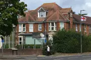 Somali man arrested after stabbing at asylum hotel leaves man fighting for life