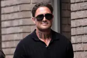Stephen Bear jailed for taunting police from Brazil beach