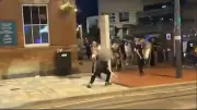 Teen with machete chases man outside Birmingham nightclub as onlookers laugh