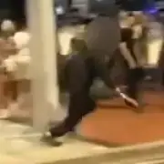 Teen with machete chases man through crowded Birmingham street