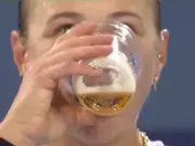 Tennis ace 'drinks beer in the middle of match' then immediately misses the ball