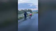 Thug knocks cyclist into traffic in random attack; arrest made