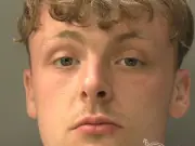 Thug who strangled partner and kept her captive is jailed