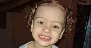 Toddler dies after neighbour's dog drags her into woods; 3 charged