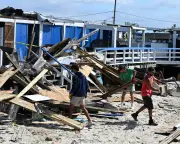 Tornadoes and flash flooding hit US north-east; UK braces for storms