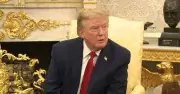 Trump clashes with CNN reporter over aide question