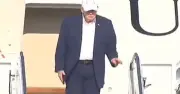 Trump's leg-slapping stair descent sparks health concerns
