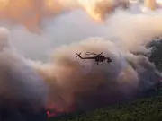 Two firefighting helicopters crash in Greece wildfire collision